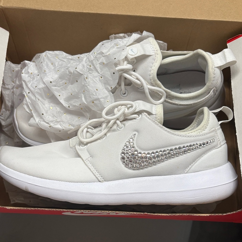 Nike White Athletic Shoes with Silver Accents